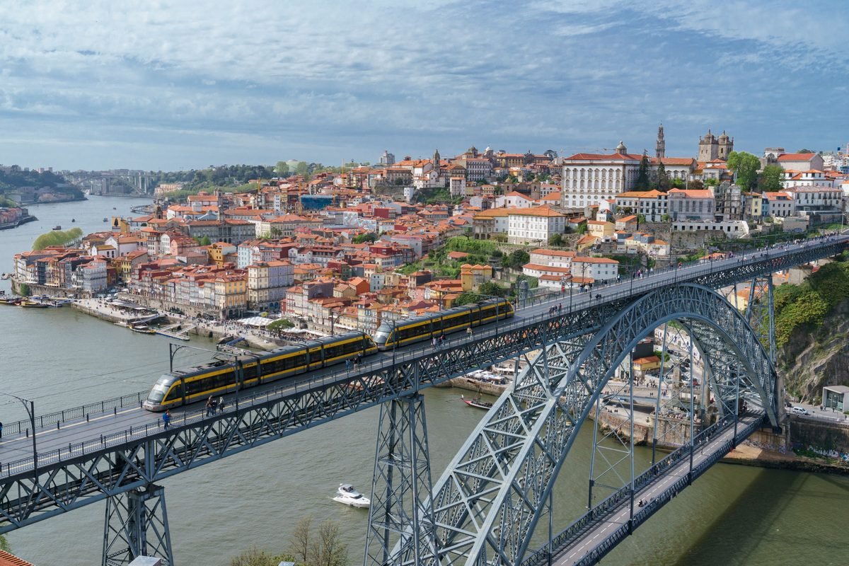 Elevated view of the Luis I bridge and Porto rooftops.