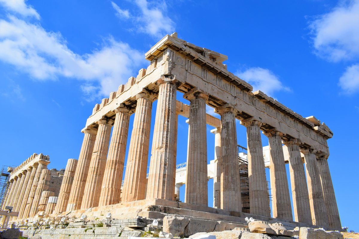 The Parthenon in Athens under a bright blue sky