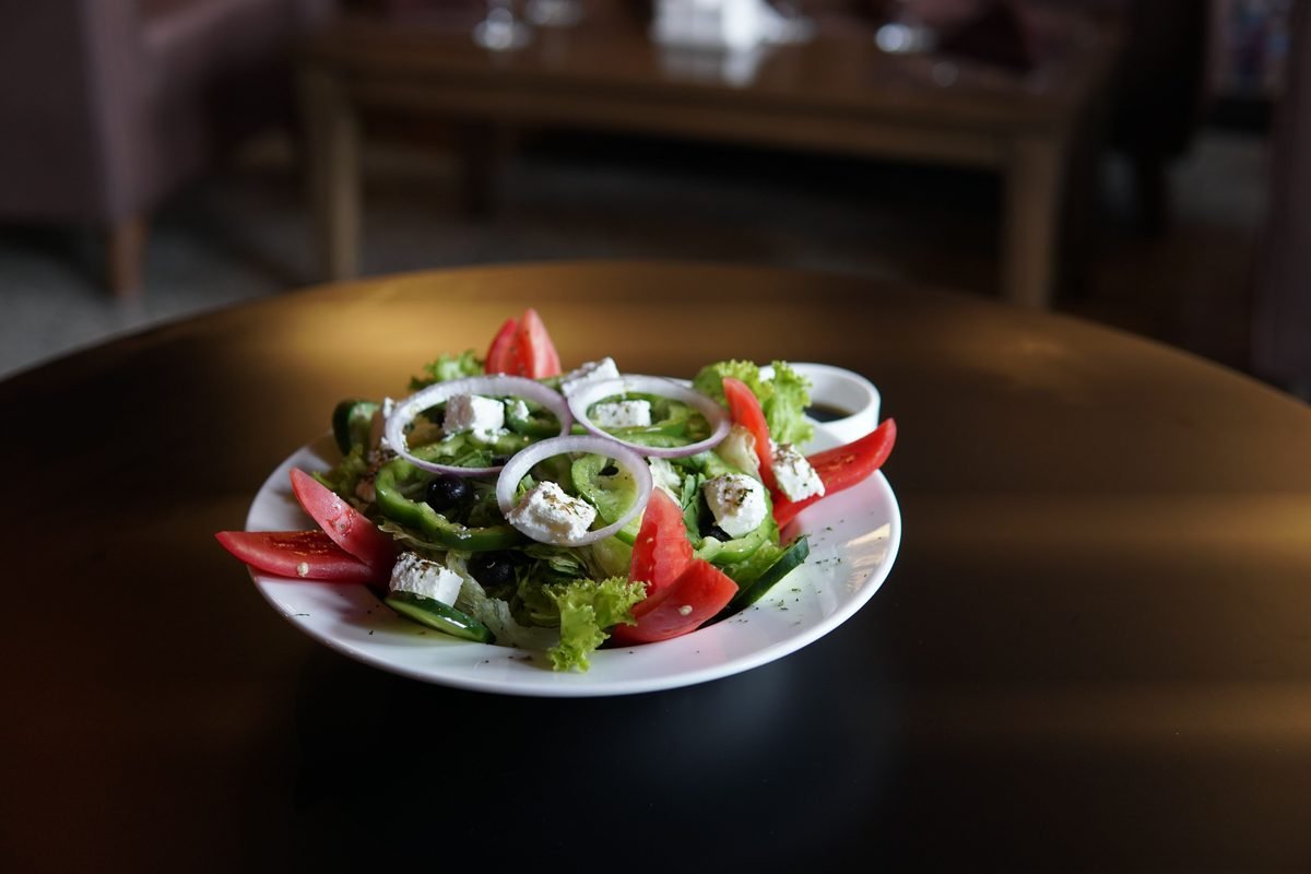 Fresh Greek salad with feta cheese, tomatoes, and olives