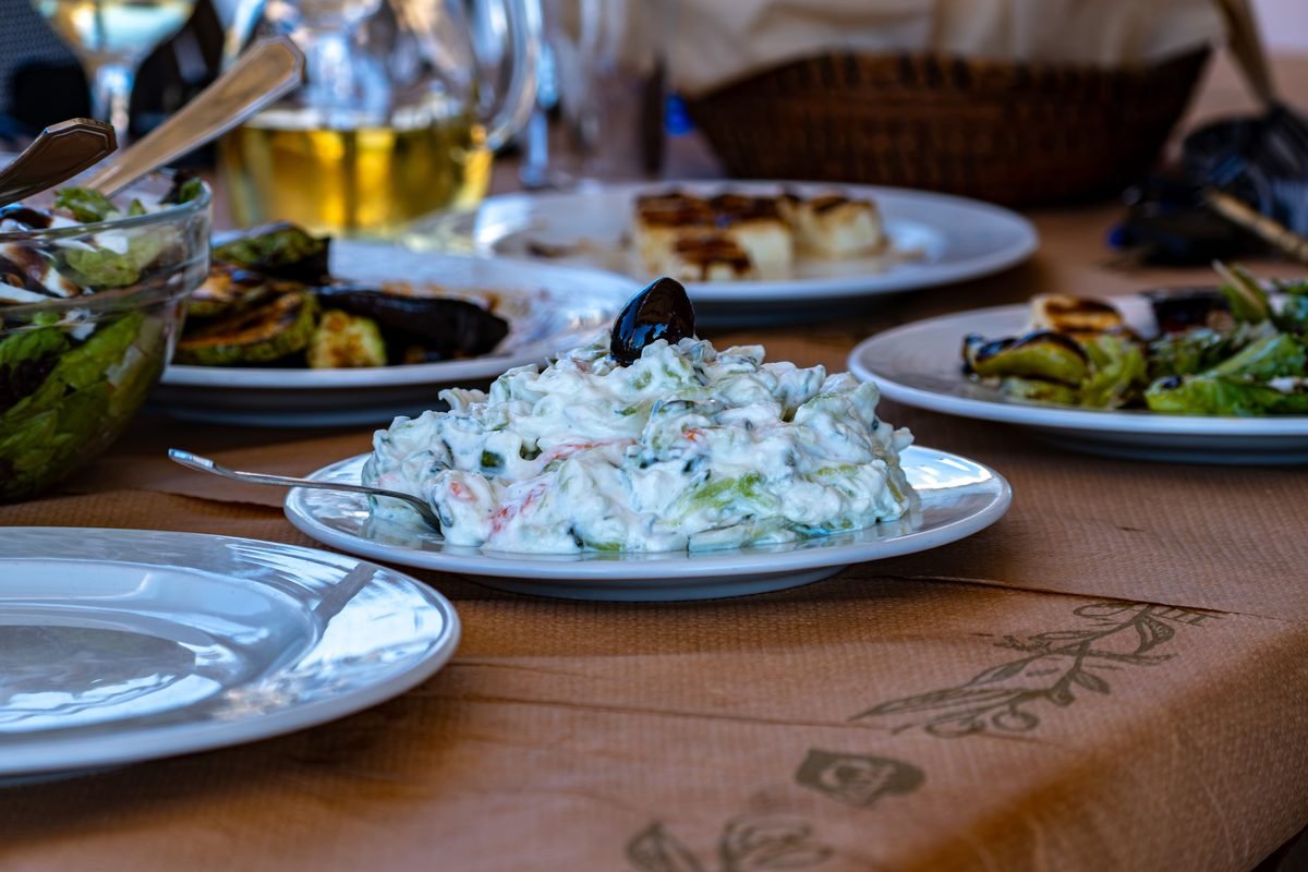 Traditional Mediterranean mezze dishes and salads on a table
