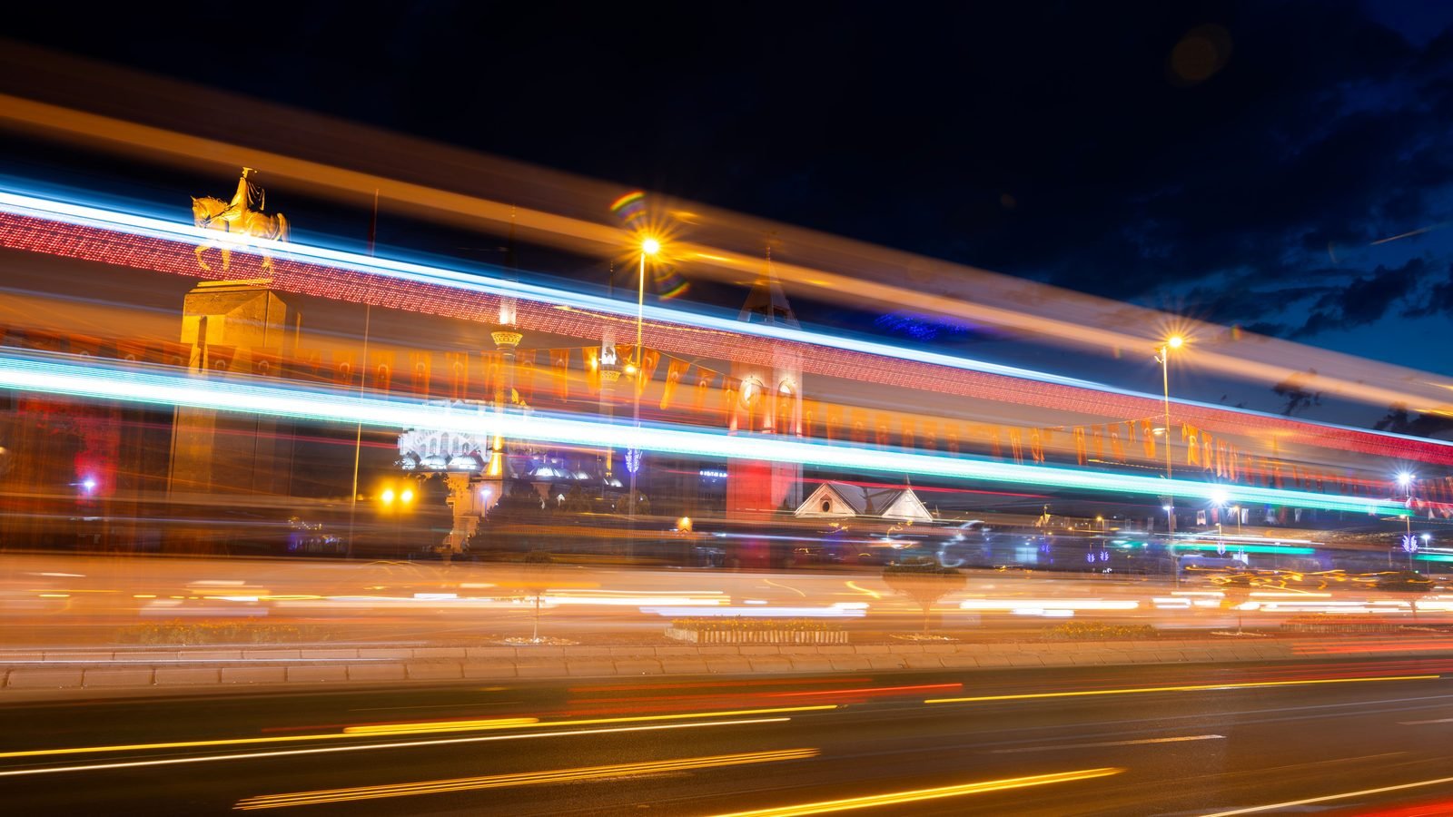 Vivid city night scene with light trails