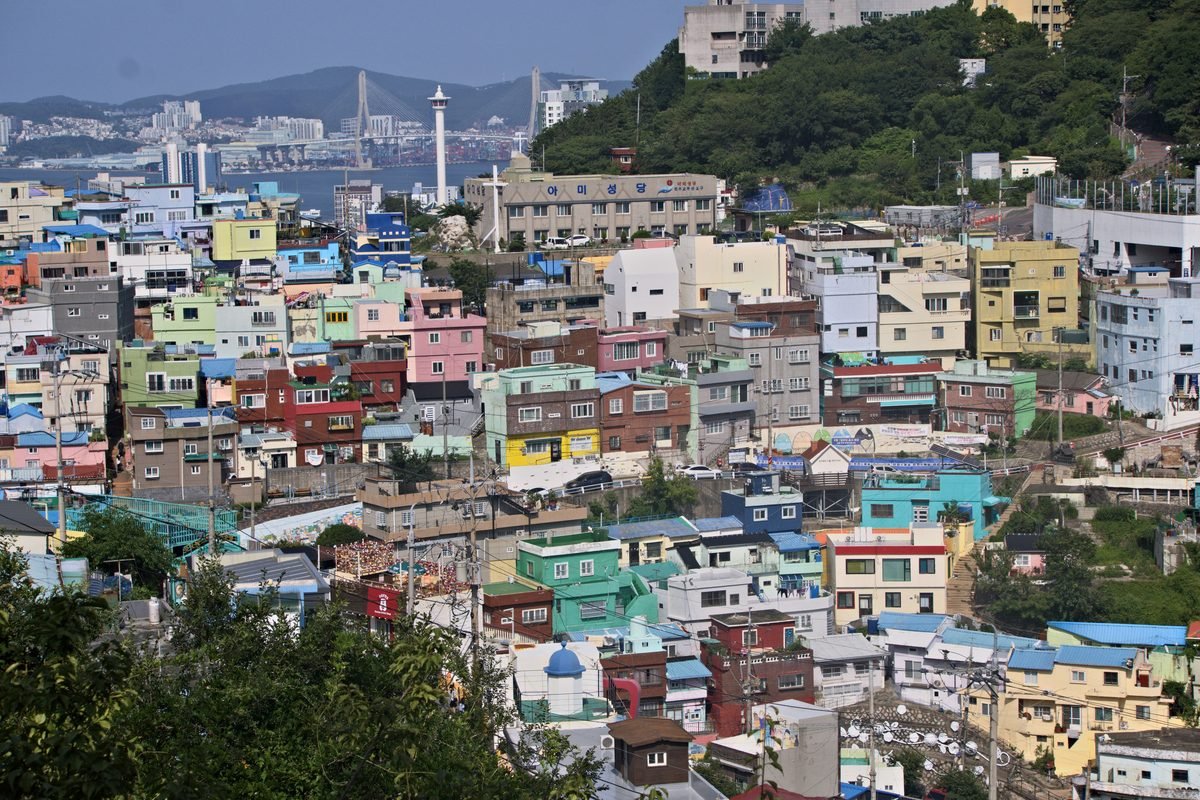 Colorful houses stacked closely on a hillside in Gamcheon Culture Village