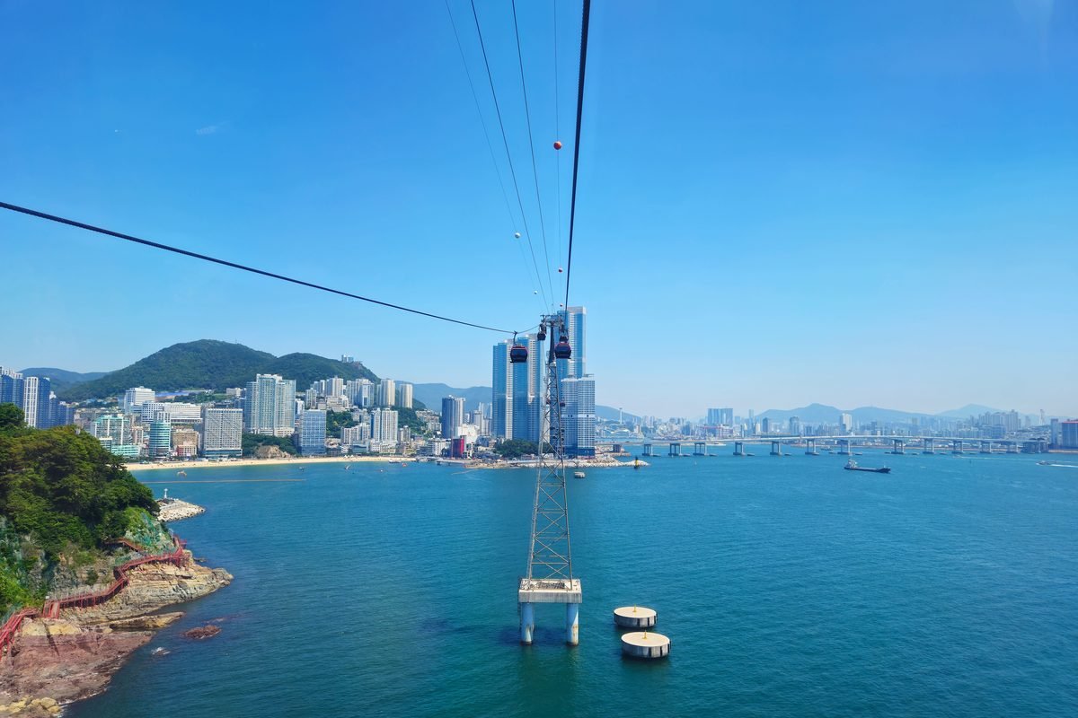 Scenic aerial view of Busan with Songdo cable car over the sea