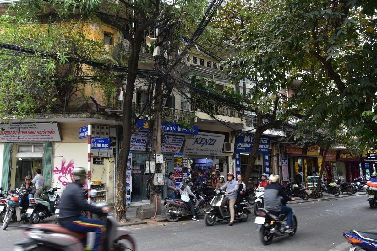 Motorbikes and shophouses on Hang Bac Street in Hanoi's Old Quarter