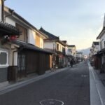 Miyuki-dori street in Mameda-machi, Hita, lined with white-plastered merchant houses