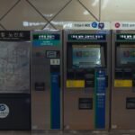 Metropolitan railway map and ticket vending machines in Seoul Metro station.