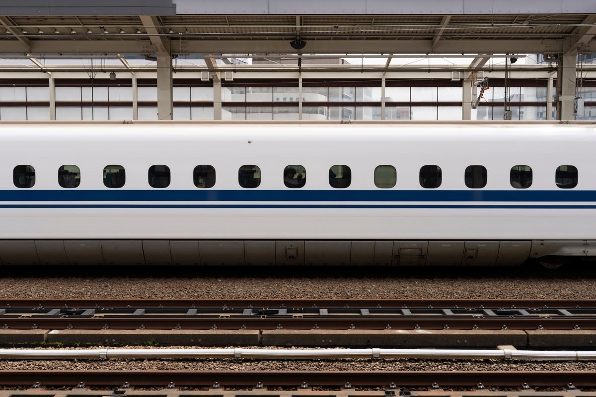 High-speed bullet train exterior on a platform at Osaka Station