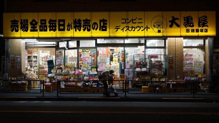 Brightly illuminated Tokyo convenience store at night