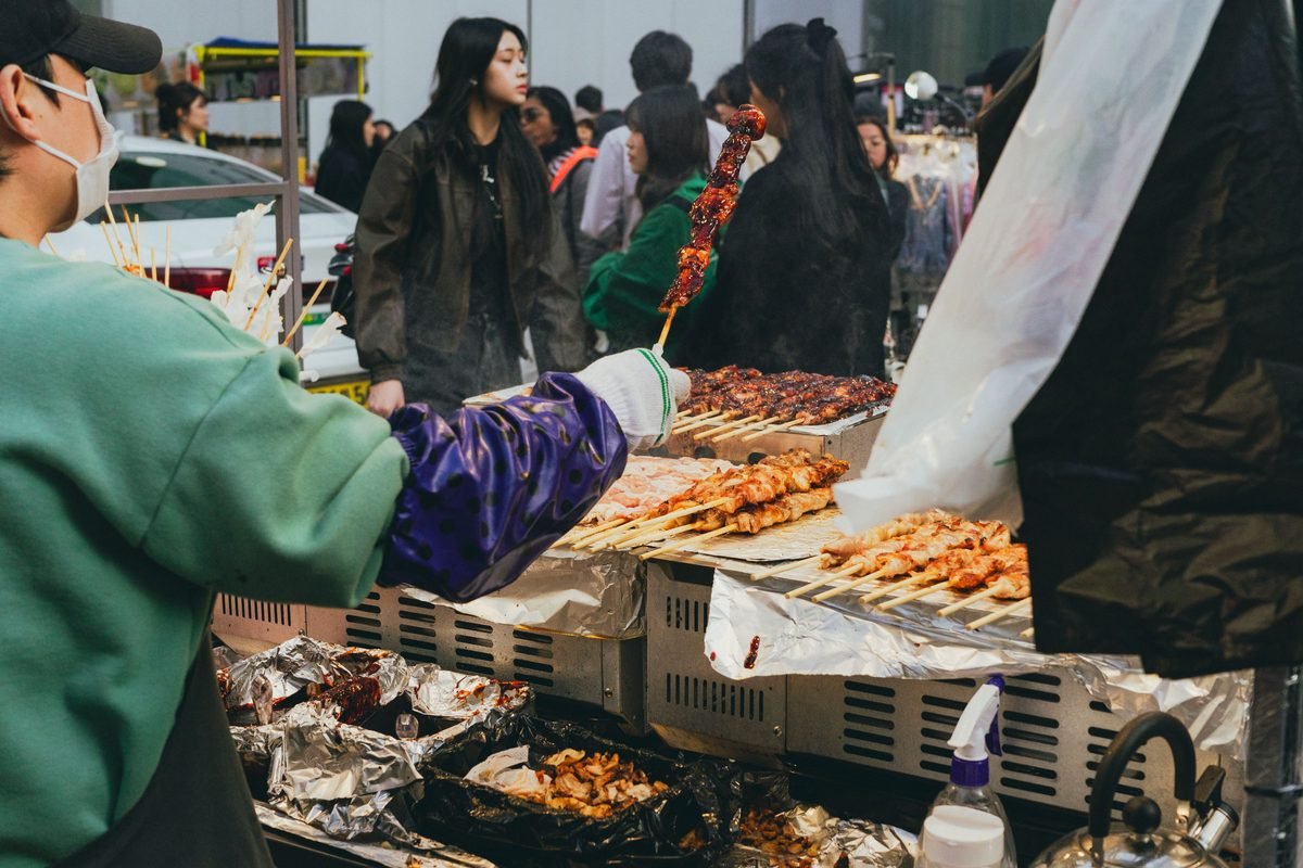 Street food vendor serving steamed delicacies