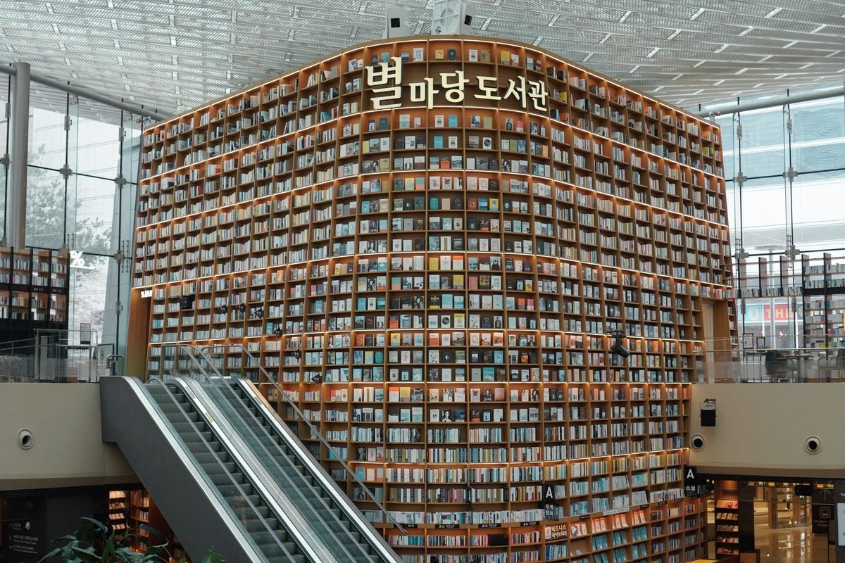 Interior view of Starfield Library with towering bookshelves in COEX Mall Seoul