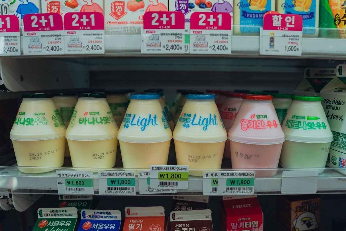 Convenience store fridge stocked with Korean dairy drinks.