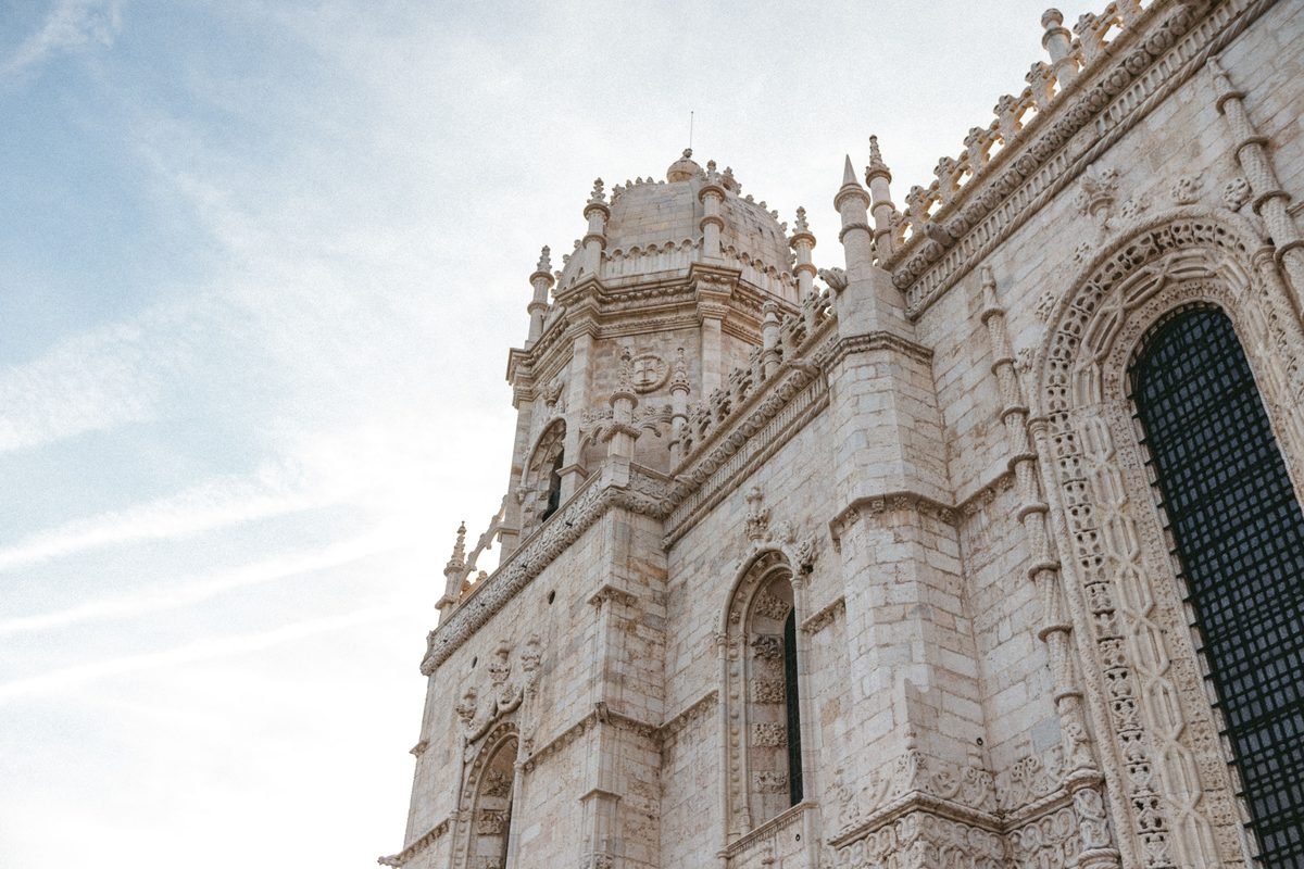 Detailed view of Jerónimos Monastery featuring Gothic architecture in Lisbon.