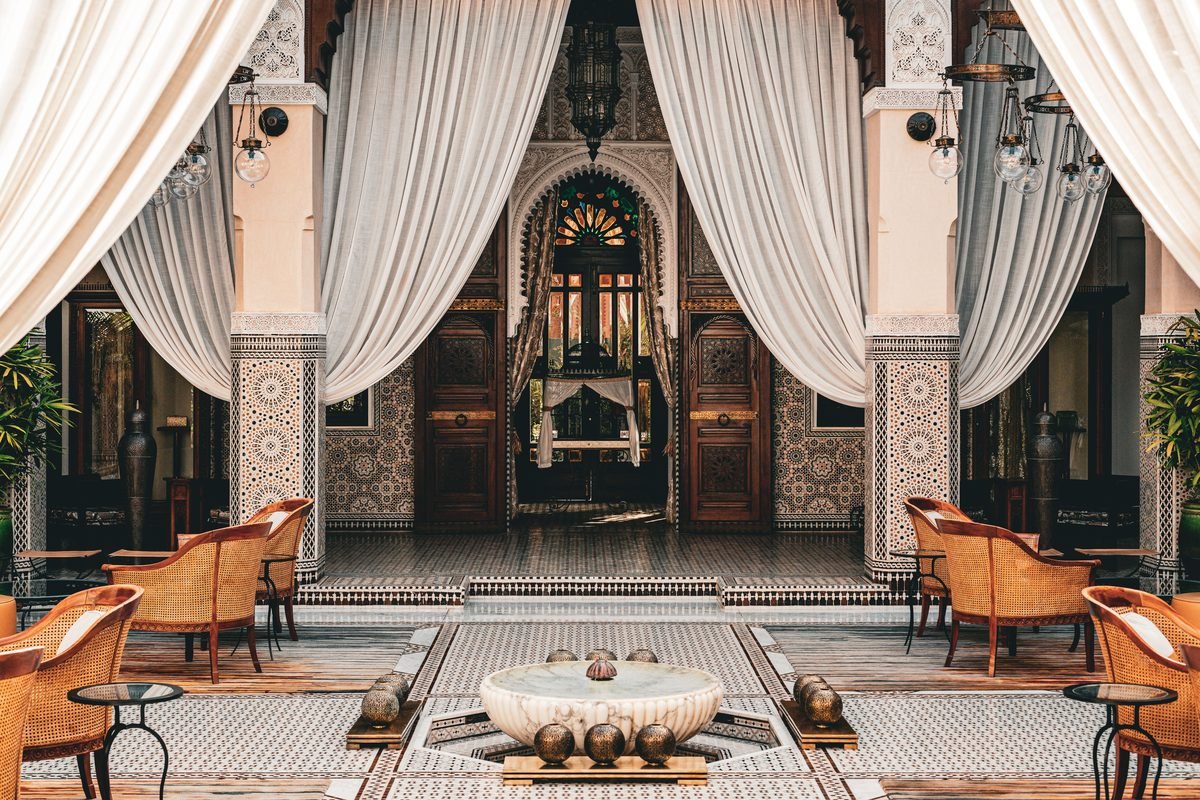 Luxurious Moroccan courtyard with mosaic tile work in Marrakesh