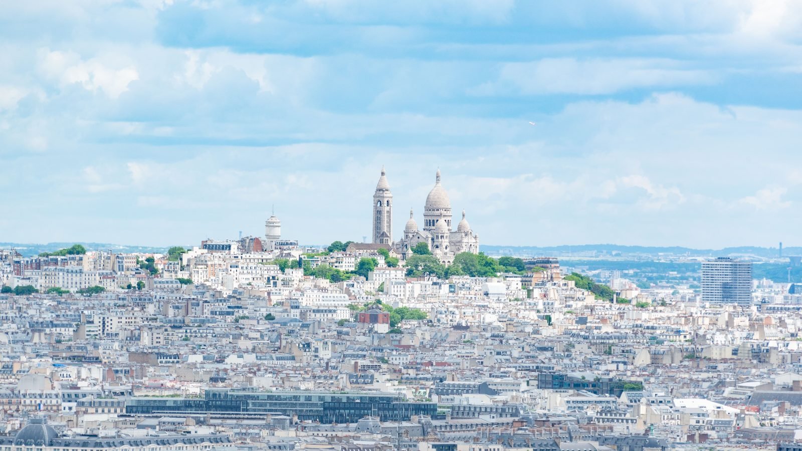Aerial view of Montmartre and Sacré-Cœur showcasing city architecture