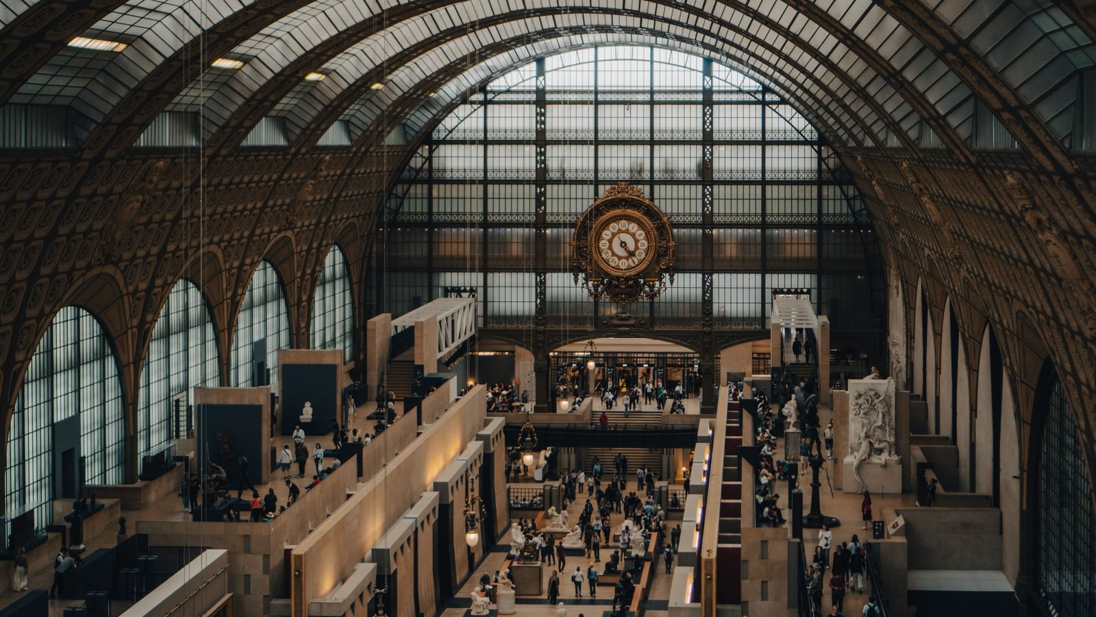 Interior gallery inside Musée d'Orsay featuring a historic clock