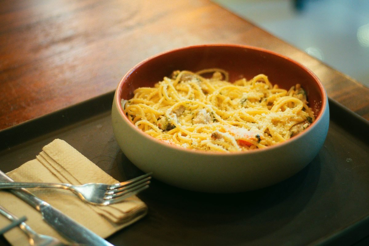 Delicious spaghetti carbonara served in a cozy setting.
