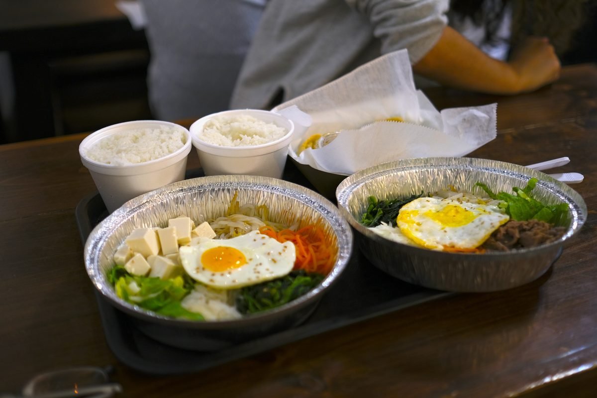 Korean bibimbap and side dishes in bowls