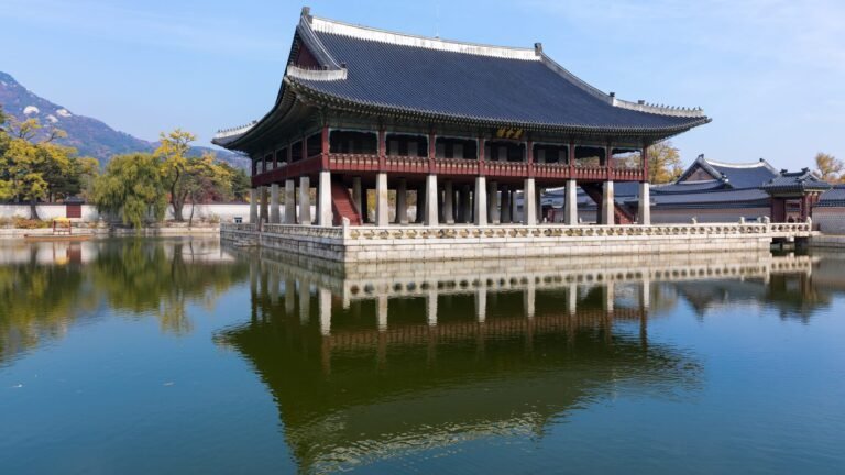 Gyeonghoeru Royal Banquet Hall over a calm pond at Gyeongbokgung Palace in Seoul.