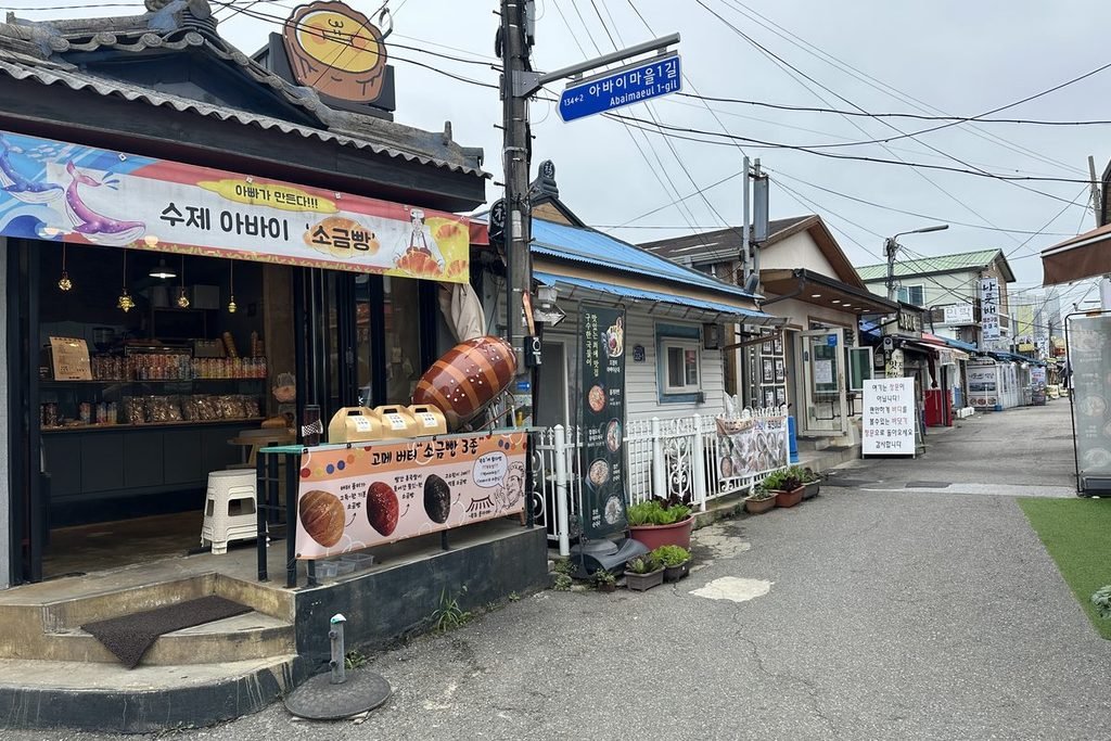 Alley with squid sundae restaurants in Abai Village, Sokcho