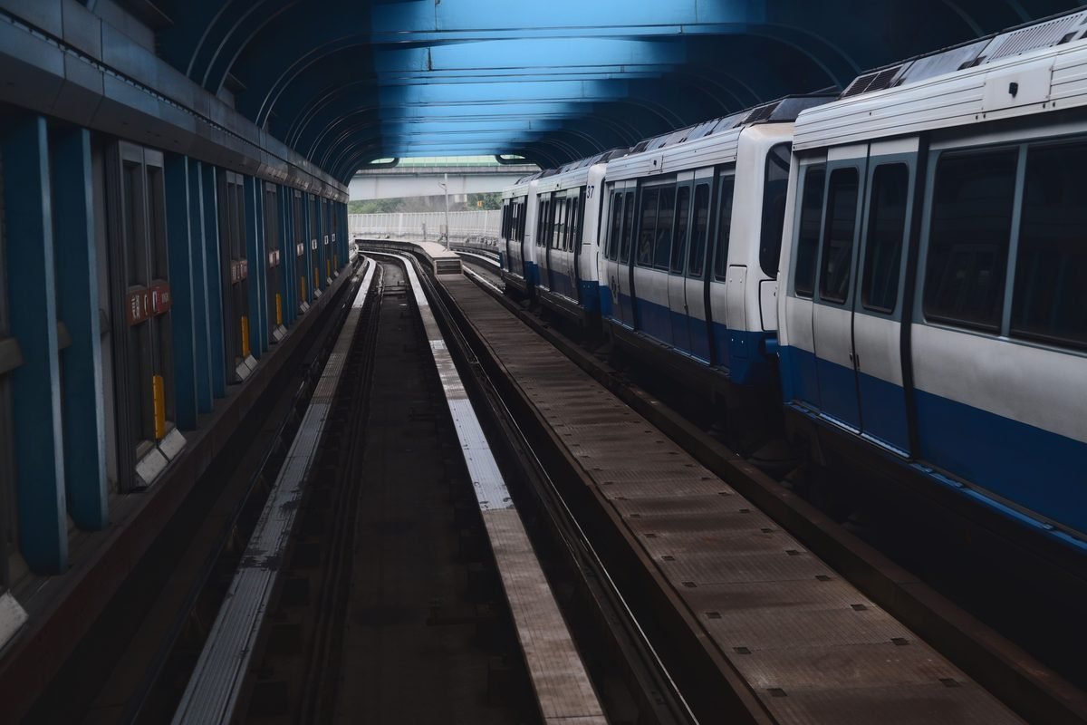 Taipei MRT metro train navigating through a modern tunnel