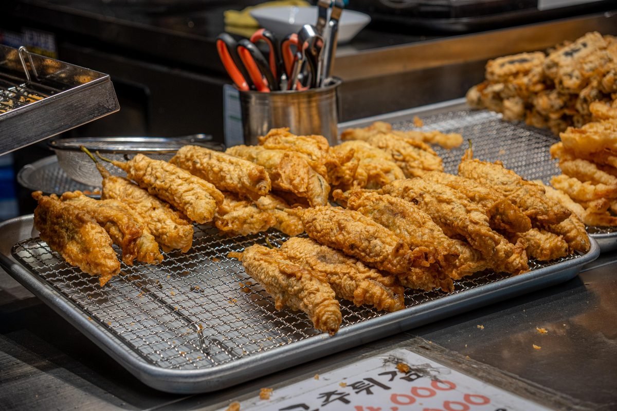 Korean fried snacks and deep-fried treats displayed at a market stall