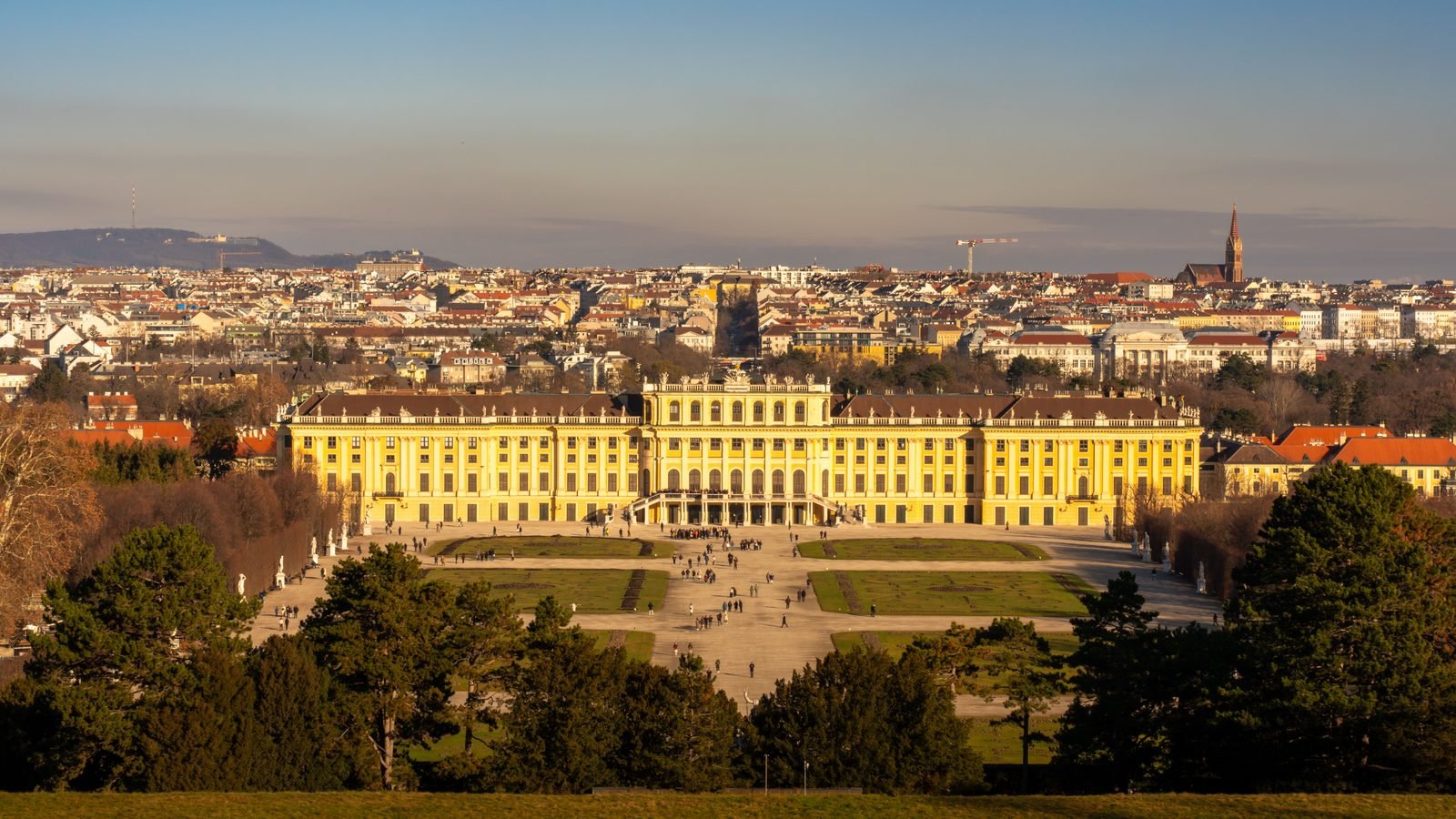 Panoramic view of Schonbrunn Palace overlooking the cityscape.