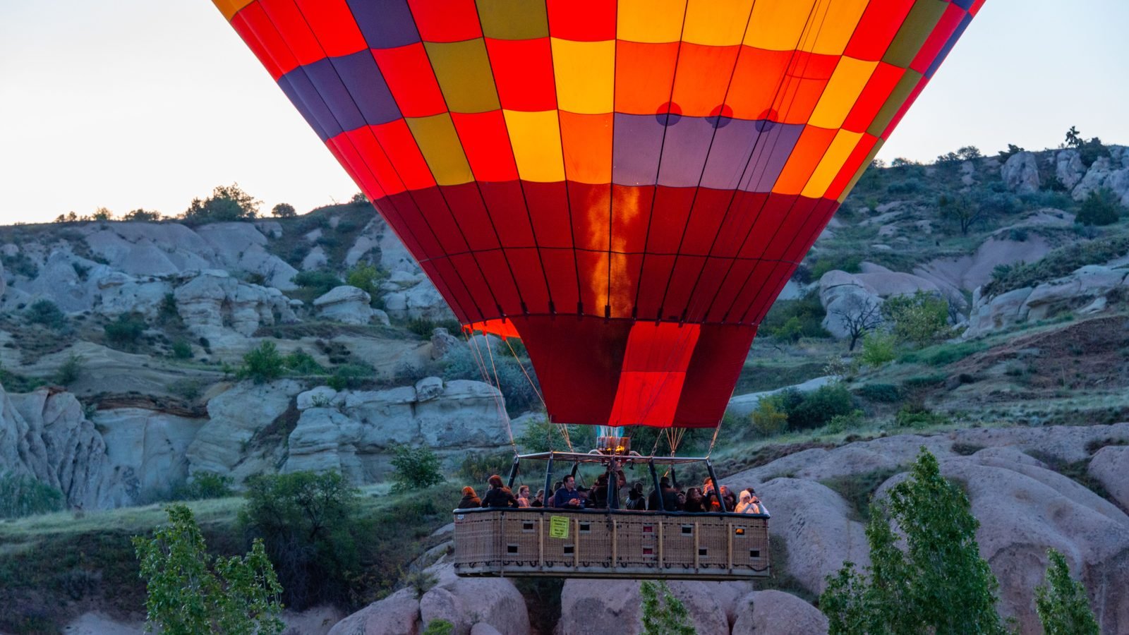 Close-up of dual hot air balloon burners during flight