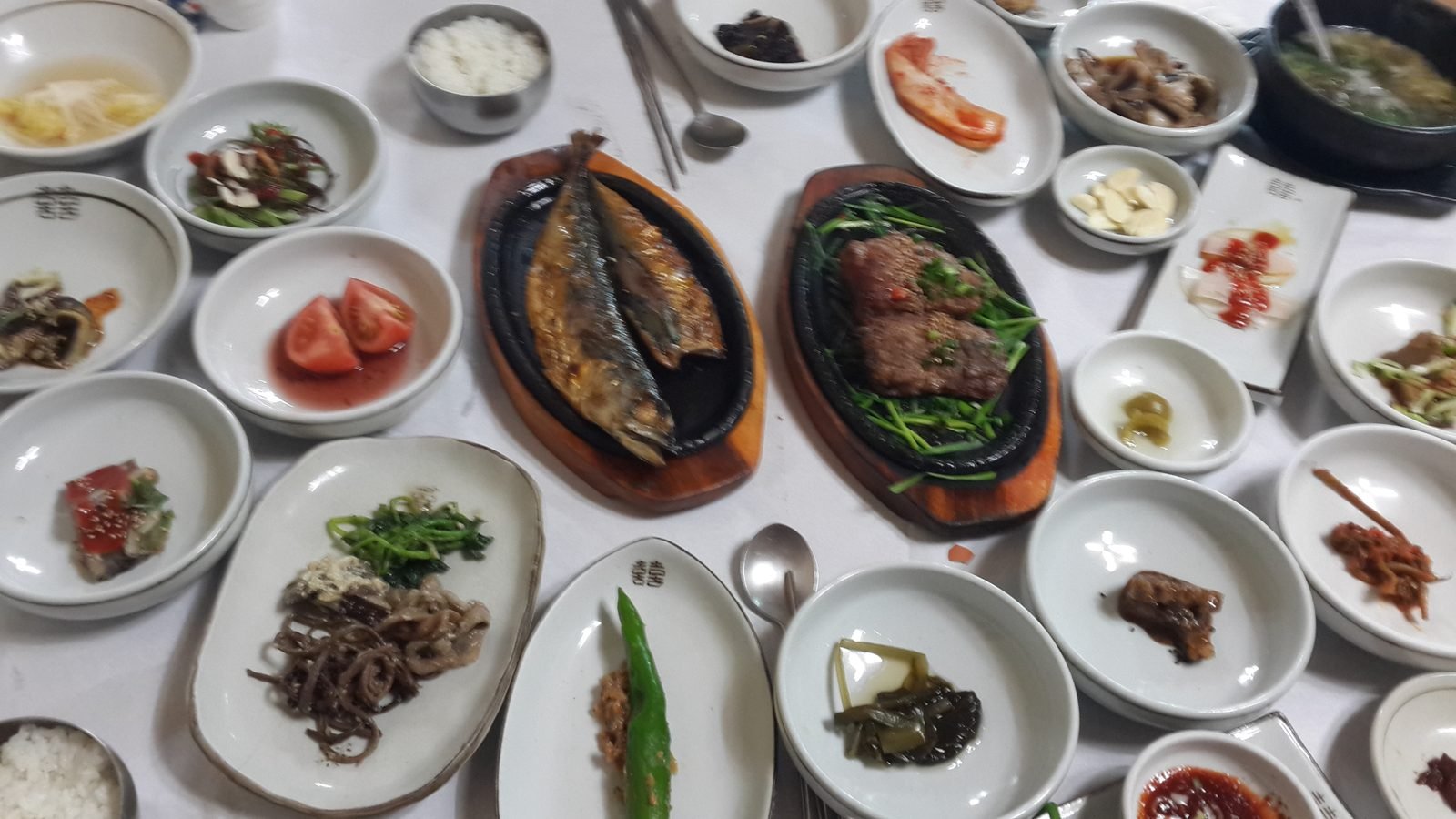 Traditional Korean full-course hanjeongsik meal spread with various small dishes in Damyang