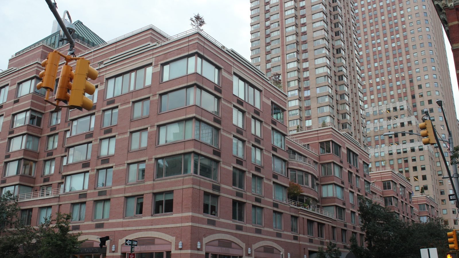 Exterior view of Worldwide Plaza complex in Manhattan New York with traffic light.