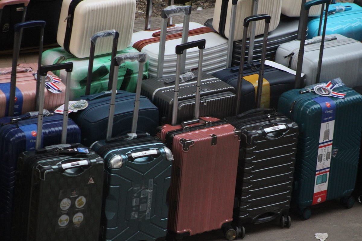 A variety of modern suitcases neatly arranged for travel