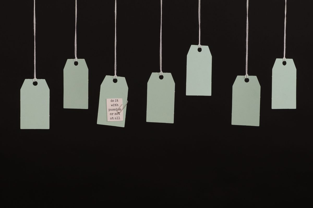 Aesthetic minimalist hanging tags on black background for branding