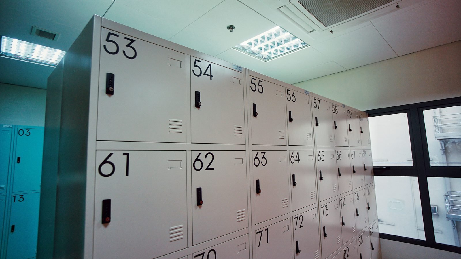Spacious and organized indoor locker room with numbered lockers