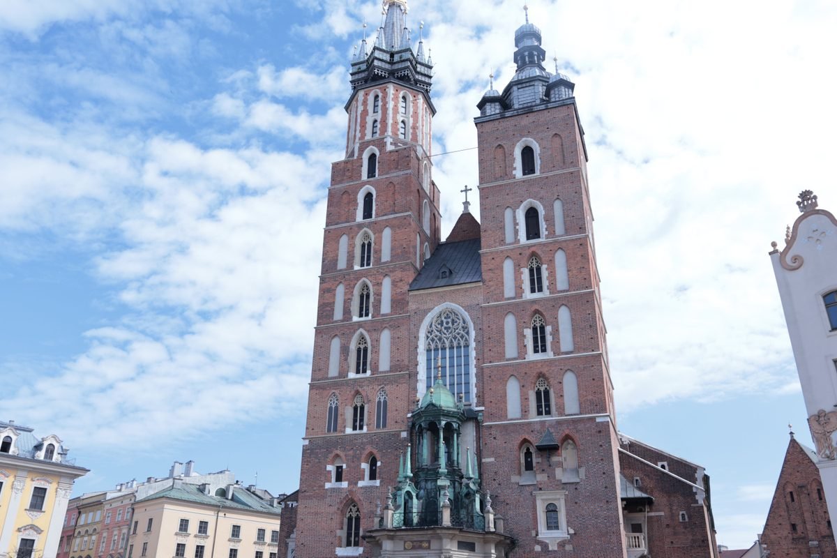 St. Mary's Basilica twin towers in Krakow captured on a sunny day.
