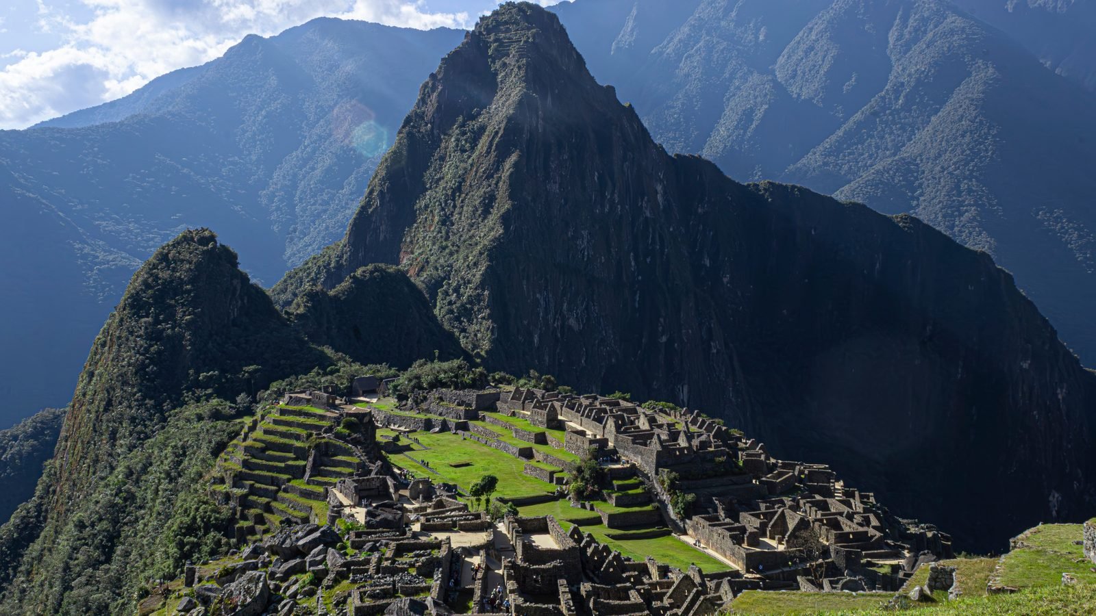 Machu Picchu stone citadel perched beneath a prominent Andean peak
