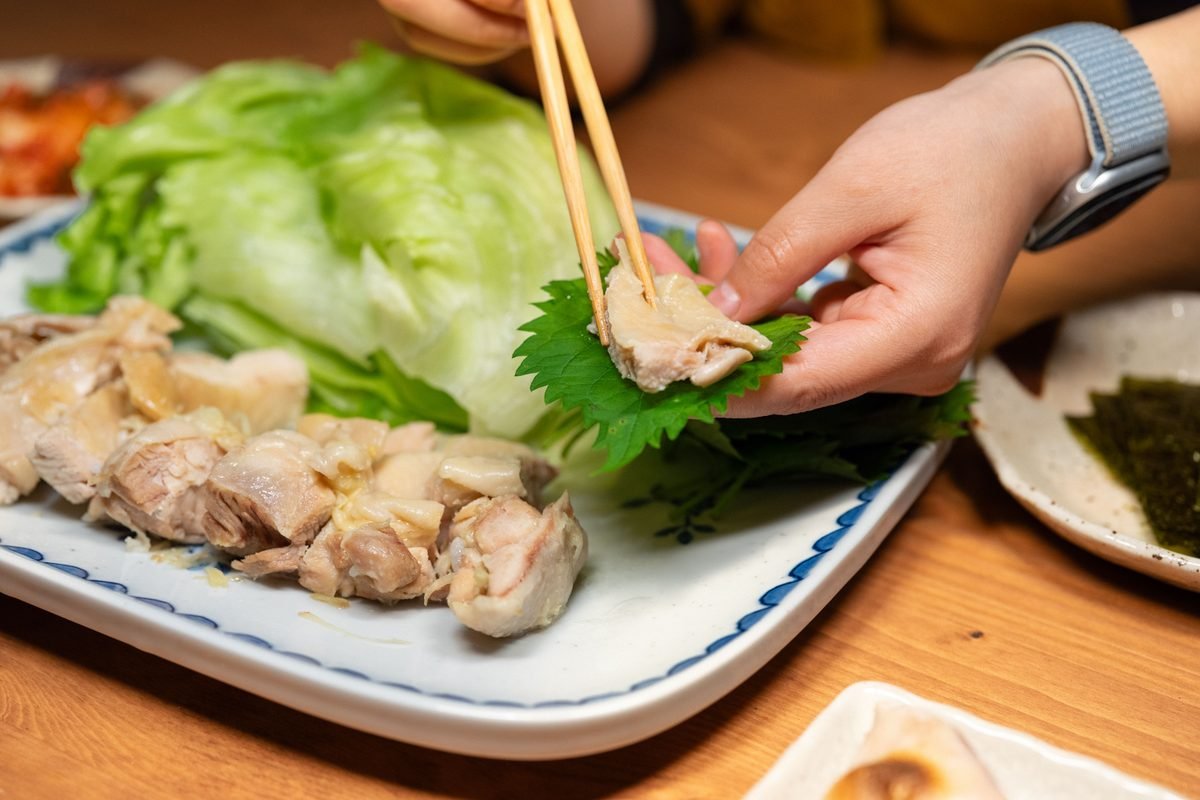 Traditional Asian hot pot dish served with fresh ingredients.