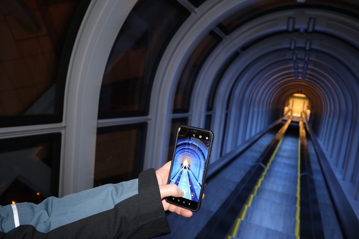 Futuristic escalator tunnel at Umeda Sky Building in Osaka