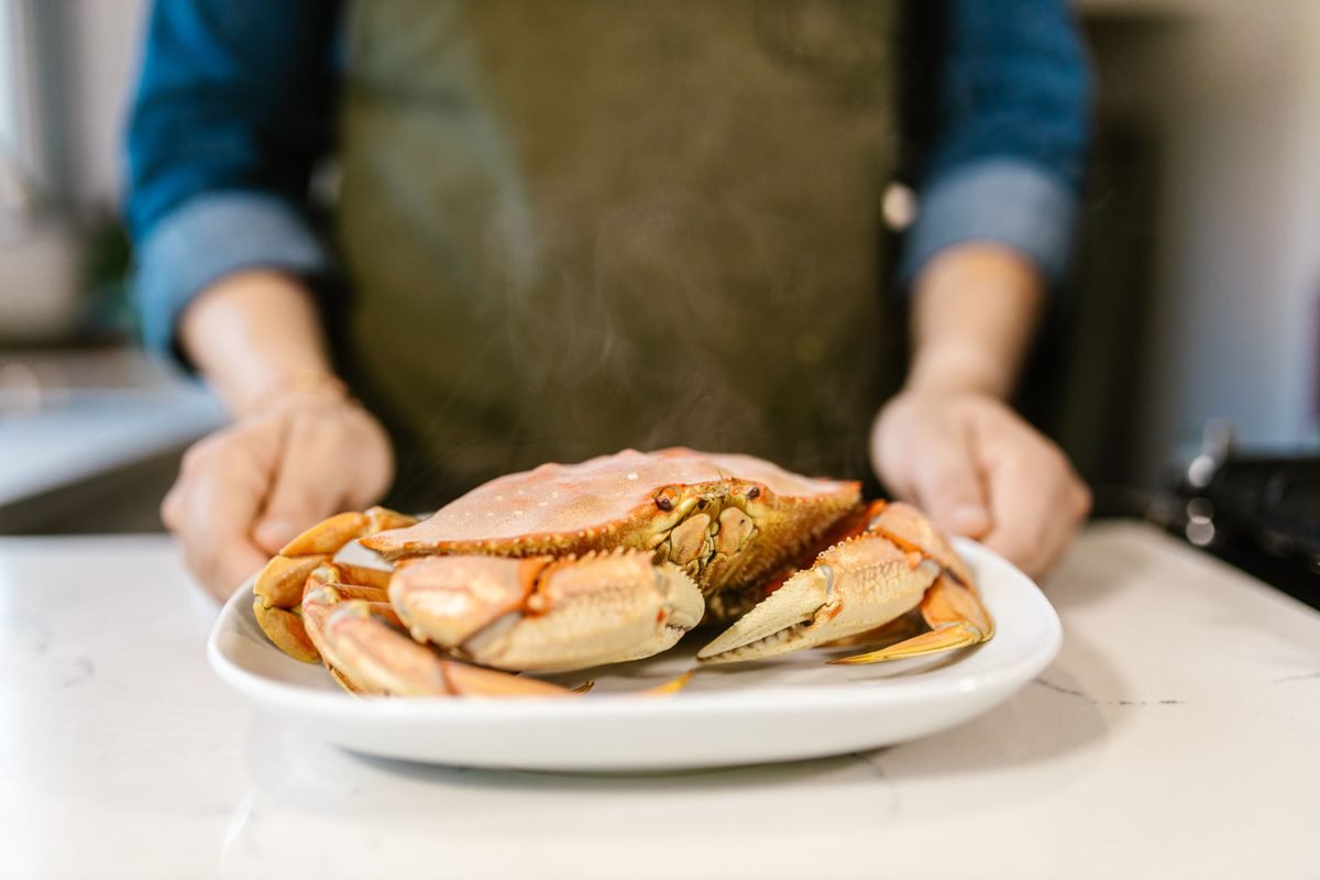 Close-up of a freshly prepared crab on a plate ready to serve