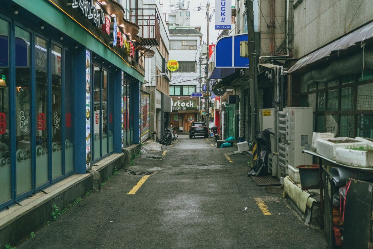 A typical narrow alleyway in Seoul showcasing local architecture