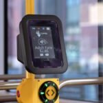 Contactless fare reader on an SF Muni tram displaying adult fare.