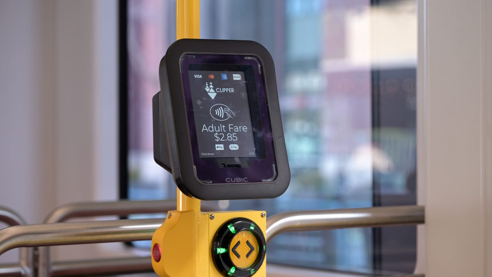 Contactless fare reader on an SF Muni tram displaying adult fare.